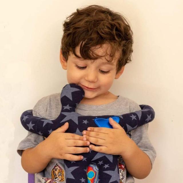 BOOK "THE ISLAND OF THE HUGGERS" + HUGGER (FLOWERS) by Hugger Island