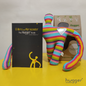 BOOK "THE ISLAND OF THE HUGGERS" + HUGGER (RAINBOW STRIPES) by Hugger Island